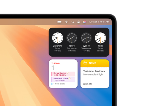 Vários widgets na Mesa de um Mac, incluindo Relógio, Calendário, Notas e Tempo.