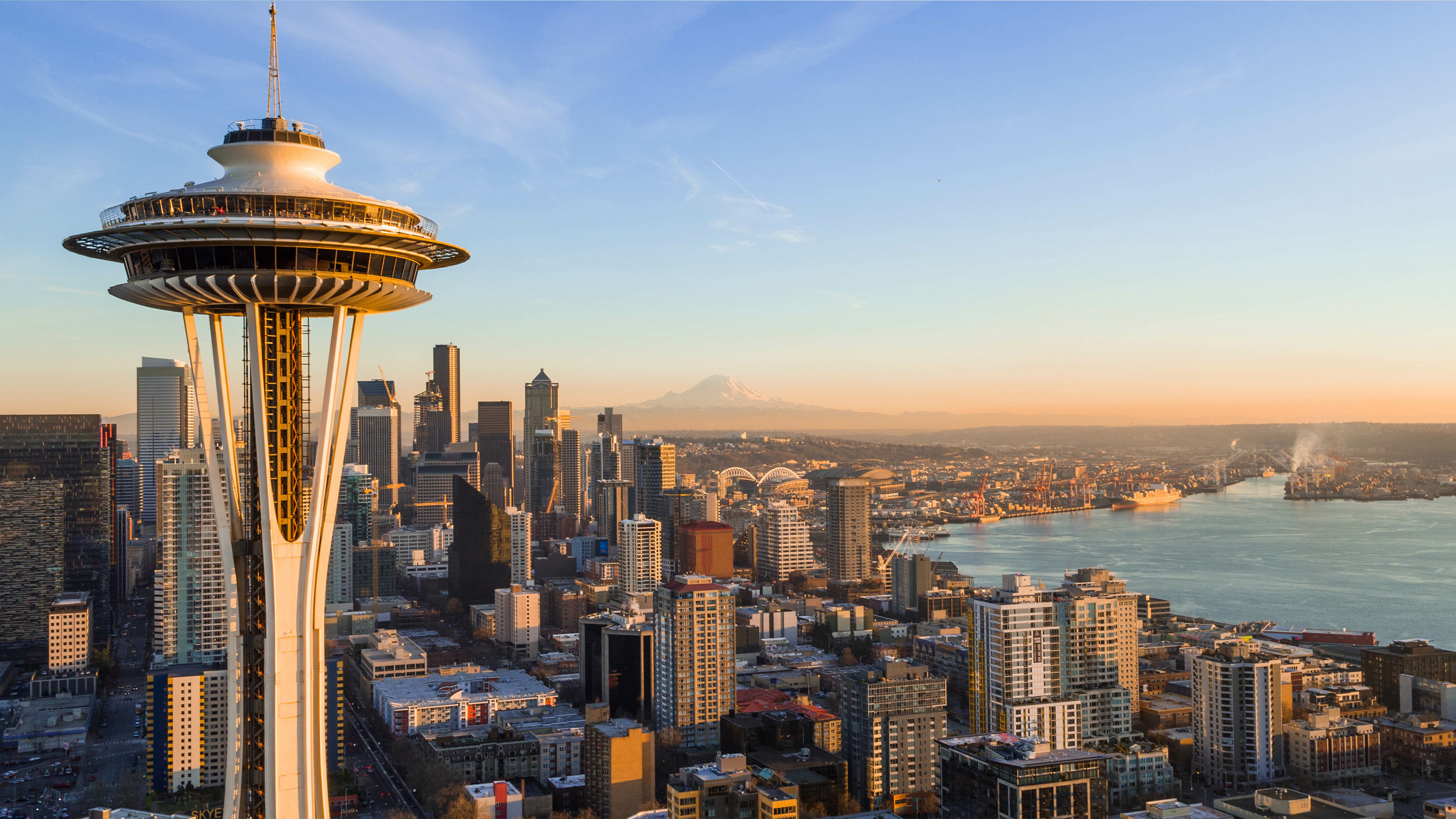Aerial view of the cityscape in Seattle, Washington, with the Space Needle in the foreground.