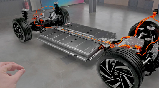 Geste de pincement pour interagir avec la projection 3D de la transmission d’une voiture